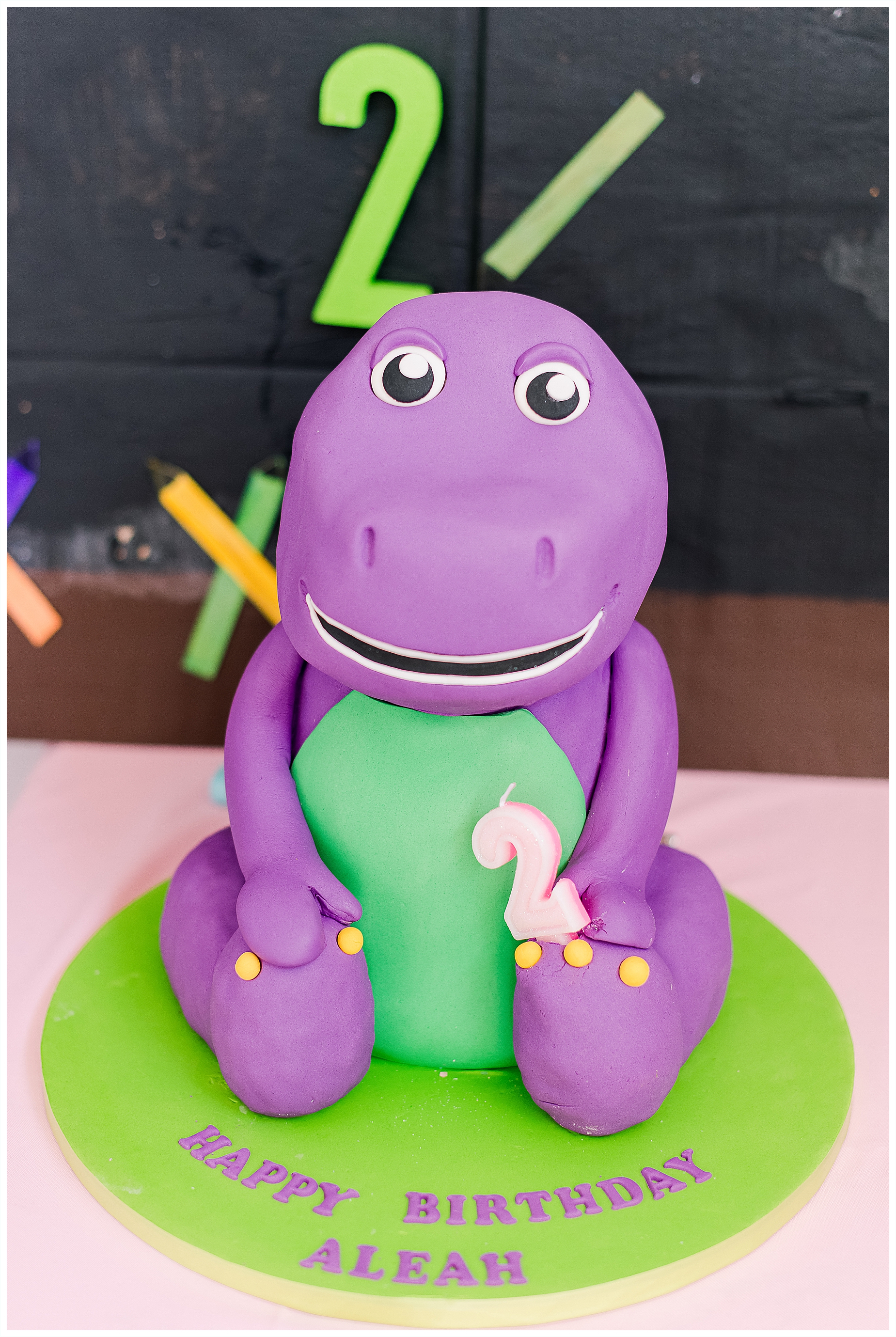 Purple and green Barney themed cake