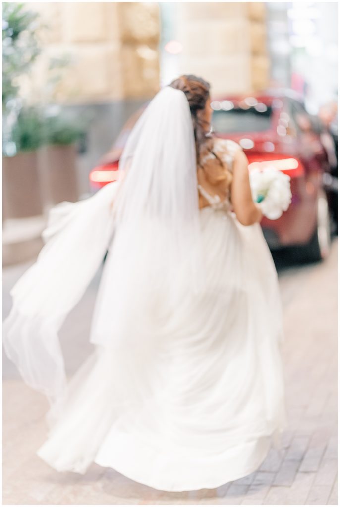 Off to get married. Motion blur of bride walking to car