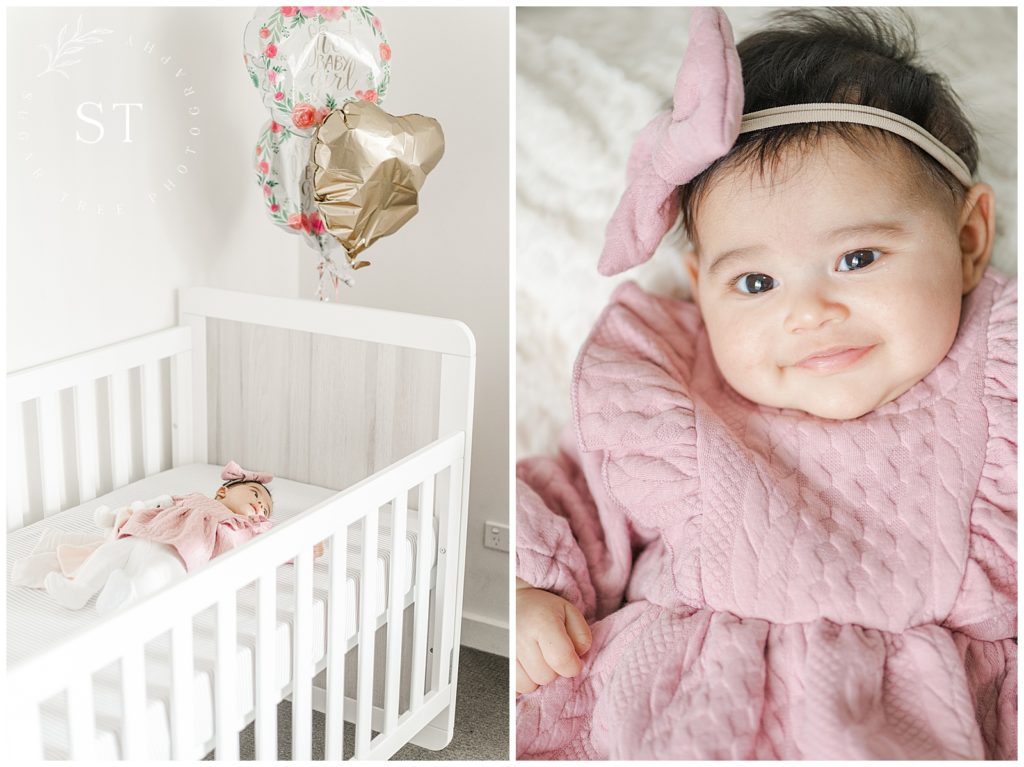 baby girl in cot and in pink dress; In-Home Lifestyle Session

