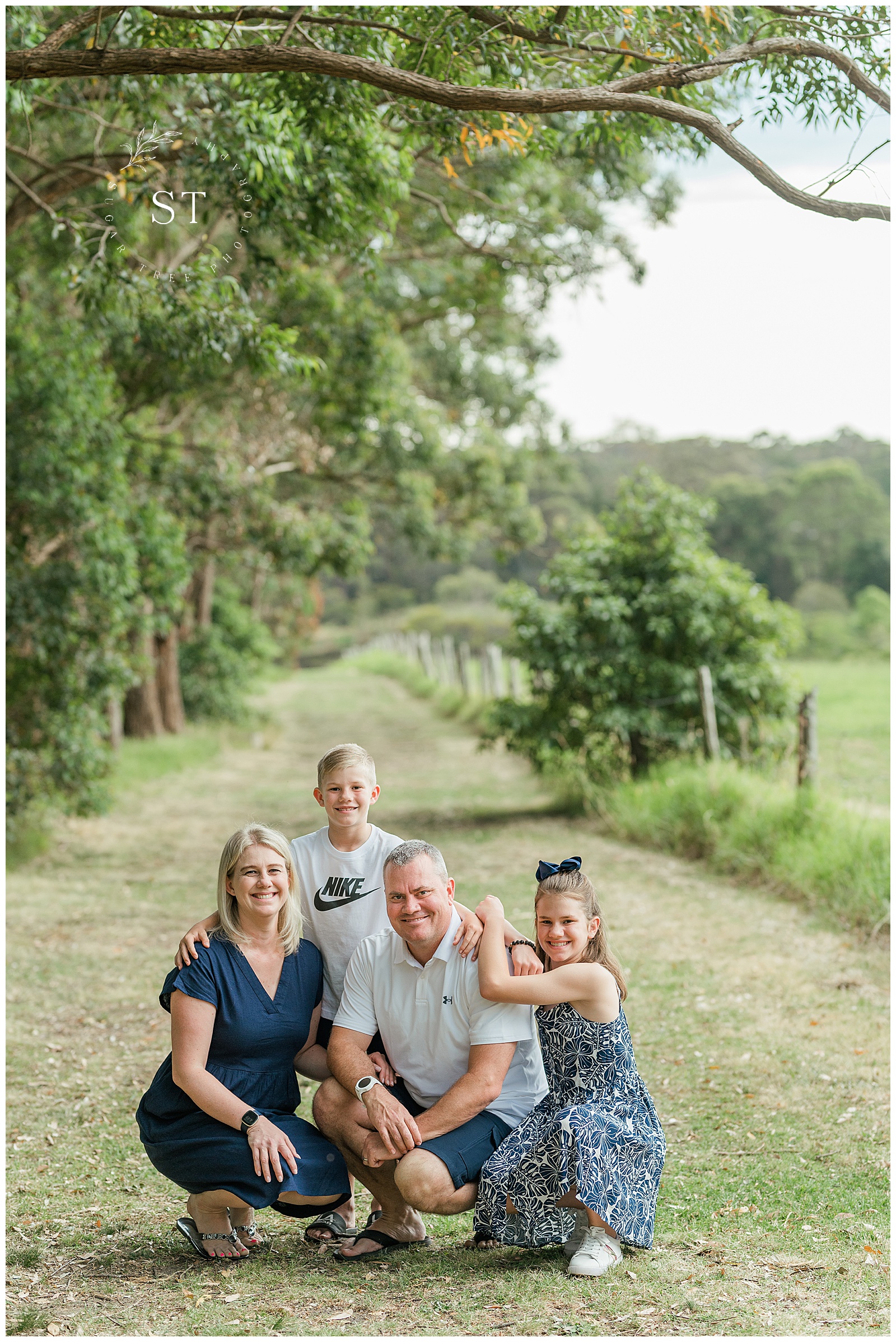 Family Photo session at Fagan Park. Tree lined alleyway