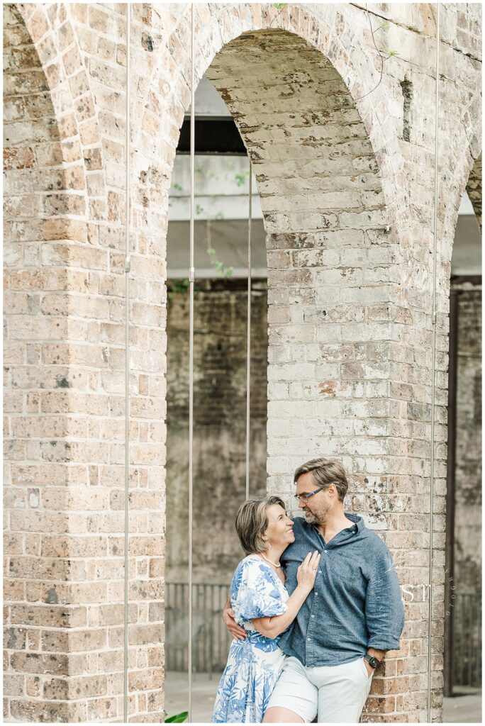 Couple at engagement shoot in blues and neutrals

